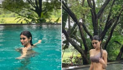 Mouni Roy looks hot in one-shouldered bikini, gets 'rainwashed' in fancy swimming pool - See pics
