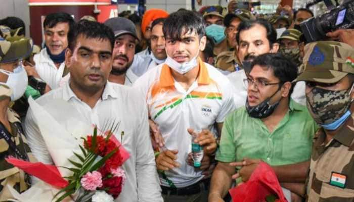 Tokyo Olympics gold medallist Neeraj Chopra gets mobbed by hundreds of fans despite tight security - WATCH