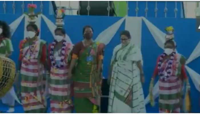 Watch: Mamata Banerjee dances, plays drum at World Tribal Day event