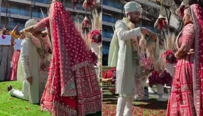 Groom goes down on one knee during varmala ceremony- Watch adorable video 