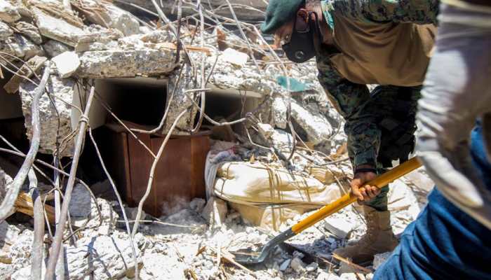 Haiti quake survivors cry for food, doctors, shelter as death toll nears 2,000