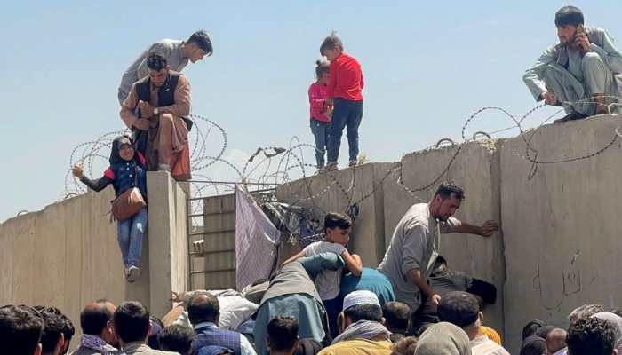 Afghanistan crisis: Taliban blame US for chaos at Kabul airport as civilians escape for life