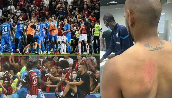 Ligue 1: Nice vs Marseille abandoned after fans invade pitch and clash with players - WATCH