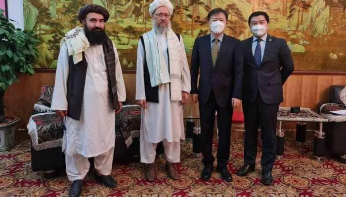 Taliban meets China's Foreign Minister, discusses current situation,  bilateral relations | World News | Zee News