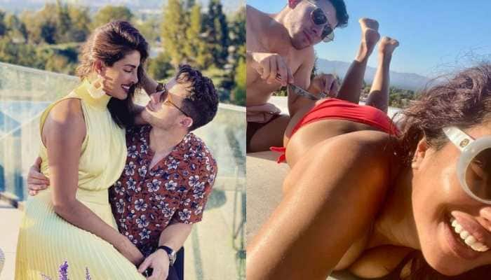 Priyanka Chopra shares new cheeky pic with hubby Nick Jonas, latter &#039;snacks&#039; on her - See Pic!