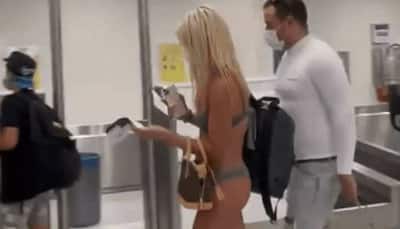 Viral video: Woman walks into US airport wearing just a bikini and face mask