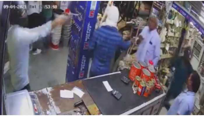 Three men enter hardware store, open fire and flee with cash leaving shopkeeper injured in Delhi-Watch video