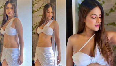 Nia Sharma's smouldering look in white bralette and slit skirt is too hot to handle - Watch