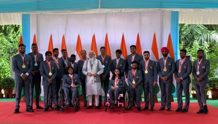 Prime Minister Narendra Modi hosting the Indian Paralympics contingent who returned from Tokyo with a record medals haul. (Photo: ANI)
