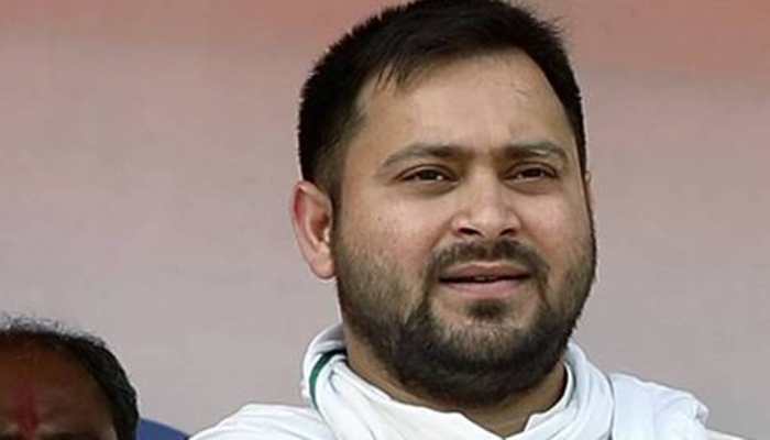 Video of Tejashwi Yadav distributing money ahead of Panchayat polls surfaces, probe ordered