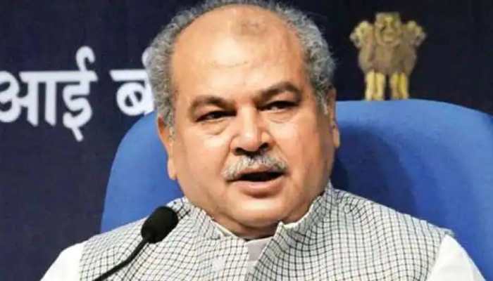 Union Minister Narendra Singh Tomar reaches Gujarat to discuss probable names for CM&#039;s post
