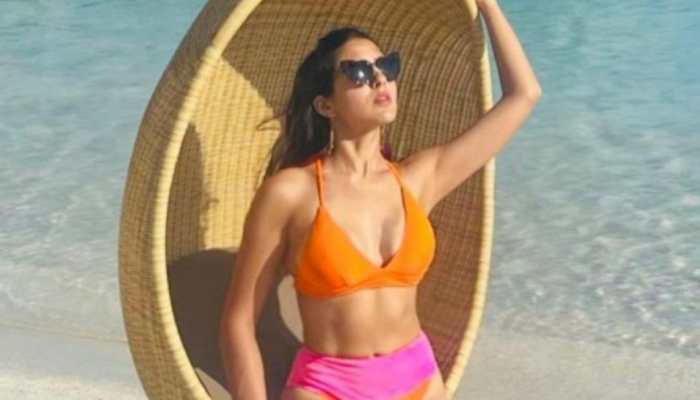Sara Ali Khan heats up internet in hot pink-orange bikini, shares pics from Maldives!