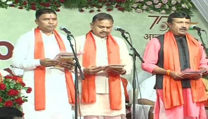New Gujarat cabinet ministers take oath despite dissent, several old faces dropped | Gujarat News | Zee News
