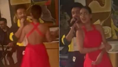 Nia Sharma sizzles in red hot, backless dress as she slow dances with Tony Kakkar! - Watch
