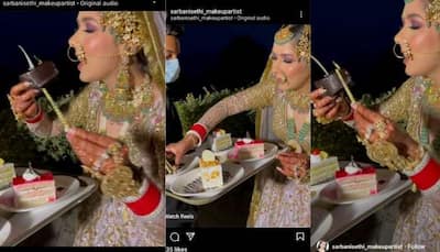 Bride caught eating pastry on her wedding day, netizens call her a 'vibe' - Watch
