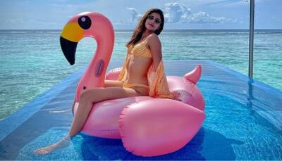 Ananya Pandey stuns in a bright orange bikini, rumoured boyfriend Ishaan Khatter is all hearts