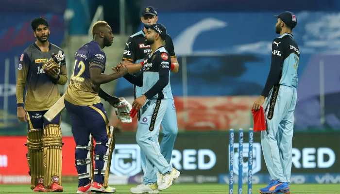 RCB captain Virat Kohli congratulates KKR all-rounder Andre Russell after his side's loss in IPL 2021 clash in Abu Dhabi. (Photo: ANI)