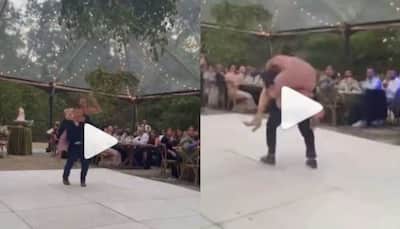 Bride and Groom go crazy on their wedding day, fall off stage while dancing- Watch viral video