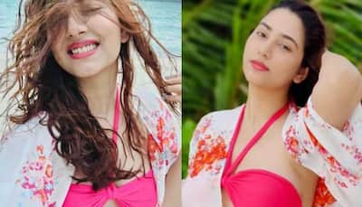 Disha Parmar heats up internet in hot pink bikini and floral beach kimono, shares pics from Maldives!