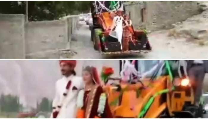 Pakistani dulha-dulhan make grand entry on excavator, watch here