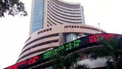Sensex, Nifty scale new peaks; TCS tanks over 6%