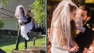 Groom carries bride’s specially-abled twin sister down the aisle in viral video, internet hearts it- Watch