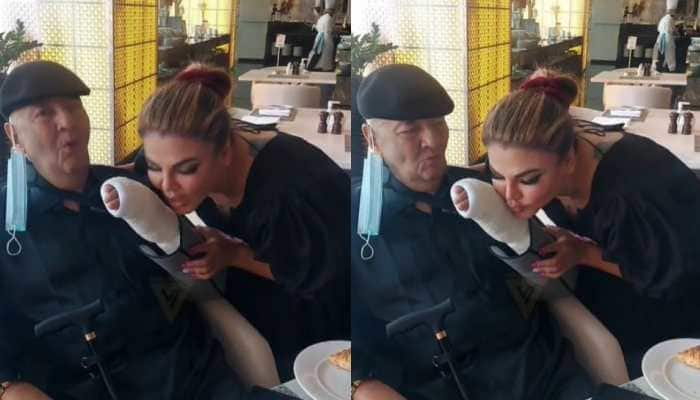 Rakhi Sawant gives a kiss to Prem Chopra&#039;s injured hand in viral video! - Watch