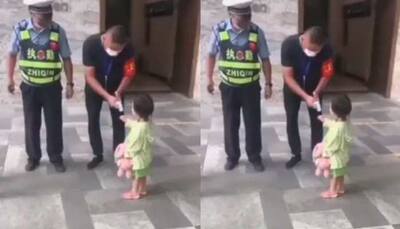 Little girl reminds guard to check her temperature in viral video, netizens applaud her ‘sense of duty’- Watch 