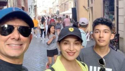 Madhuri Dixit poses with hubby Shriram and son Arin for a family photo in Italy! 