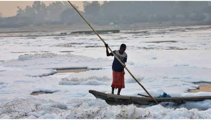 Delhi govt deploys boats to remove foam from Yamuna ahead of Chhath Puja