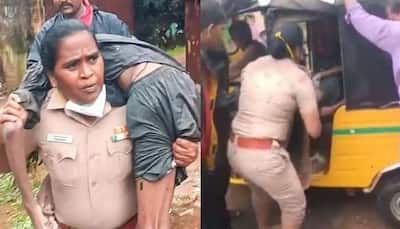 Woman cop carries unconscious man to safety amid heavy rainfall in Chennai- Watch 