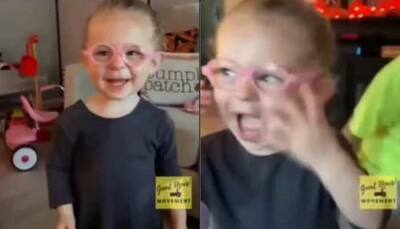 Little girl sees world clearly for first time with glasses, her reaction is priceless- Watch viral video