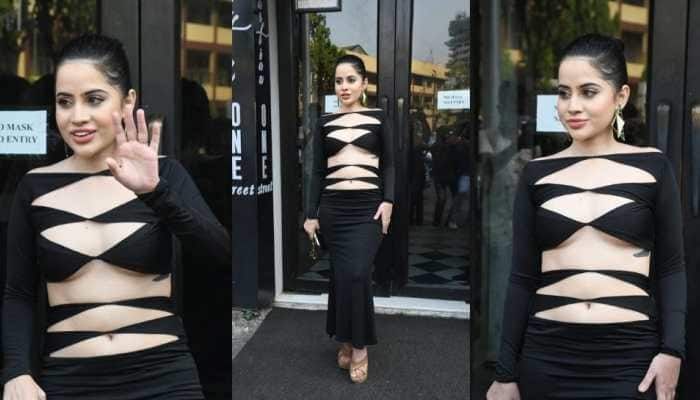 Bigg Boss fame Urfi Javed sizzles in black cut-out dress - In Pics | News | Zee News