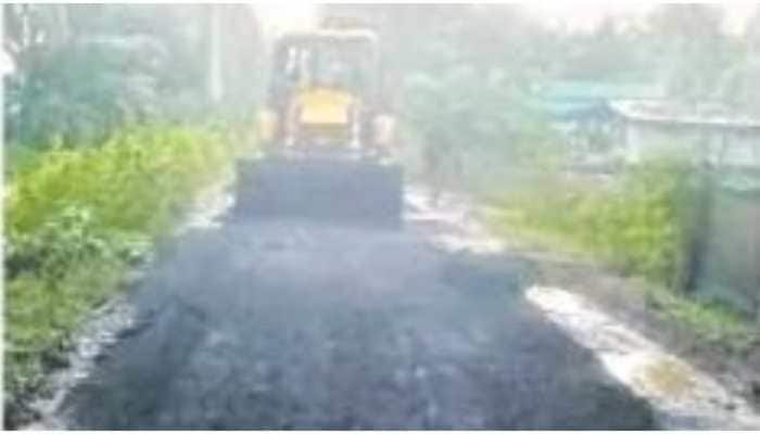 Bridegroom&#039;s family lays blacktop road just day before marriage for guests&#039; convenience 