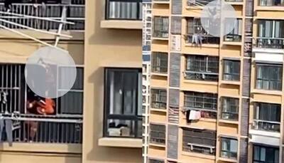 Elderly woman dangles upside down after falling off 19th floor, watch viral video to know what happens next 
