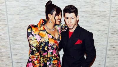 Nick Jonas fixes Priyanka Chopra's trailing floral coat at red carpet, fans shout 'such a gentleman!' - Watch