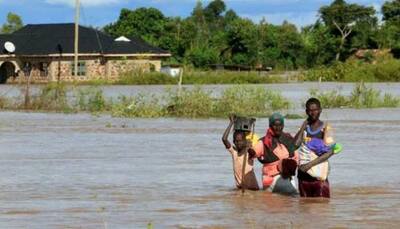 At least 20 killed as flood water sweeps bus in Kenya