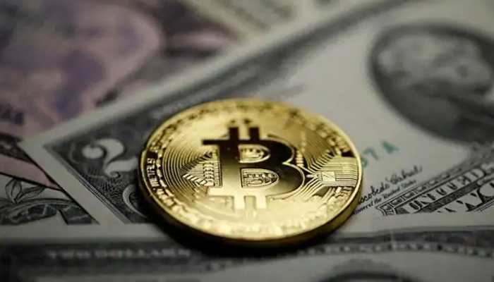 Bitcoin back over $50,000, as market calms after weekend turmoil