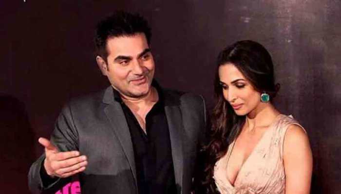 Malaika Arora, ex-husband Arbaaz Khan come together, receive son Arhaan Khan at airport with warm hug | People News | Zee News