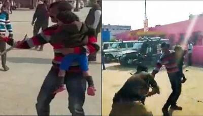 Kanpur cop suspended after video of him hitting man with child in arms in Uttar Pradesh goes viral