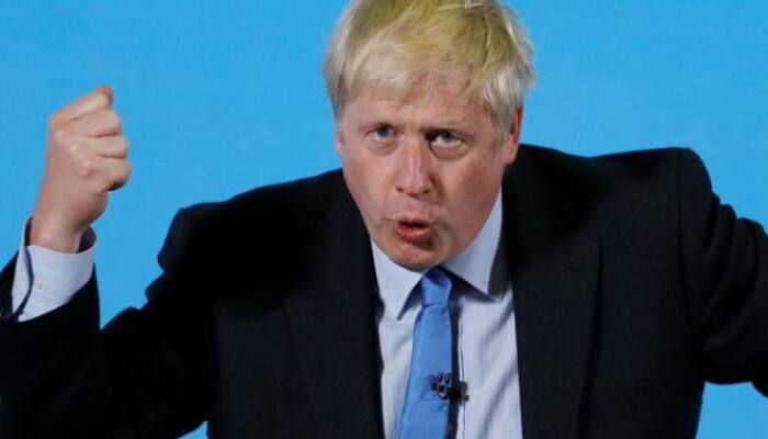UK's PM Boris Johnson warns of Omicron 'tidal wave', says two vaccine doses not enough