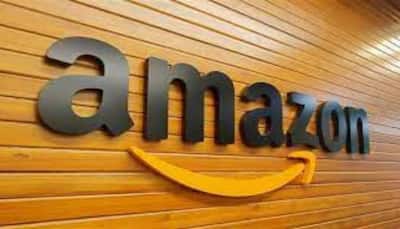 CCI fines Amazon Rs 202 crore suspends approval for deal with Future Coupons