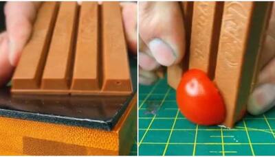 Bizarre! Man sharpens KitKat to cut tomato, internet asks 'why'- Watch viral video