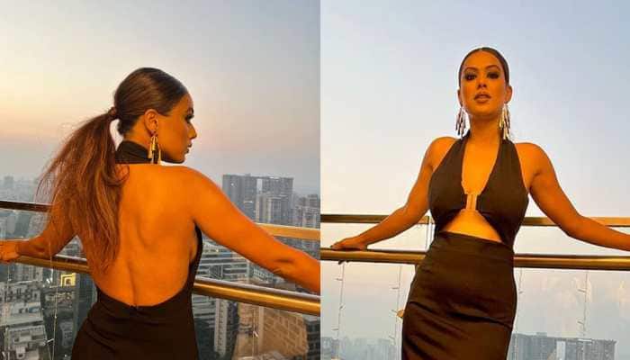 Nia Sharma&#039;s BOLD avatar in a black plunging neckline dress is uber hot - Watch