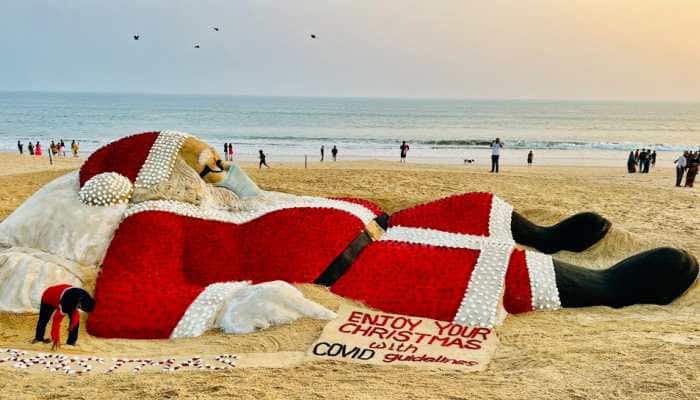 Christmas 2021: Award-winning sand artist Sudarsan Pattnaik creates Santa Claus&#039; sand sculpture with 5,400 roses, pics go viral