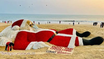 Christmas 2021: Award-winning sand artist Sudarsan Pattnaik creates Santa Claus' sand sculpture with 5,400 roses, pics go viral
