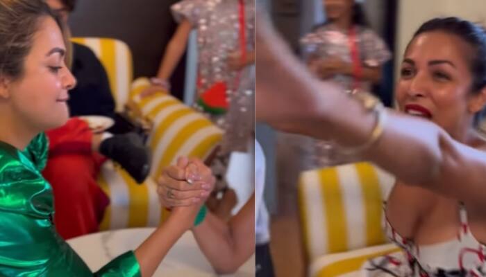 Malaika Arora beats Amrita Arora in arm-wrestling at family’s Christmas lunch party: Watch viral video