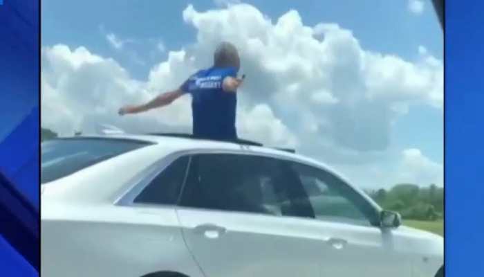 If you poke your head out of your car's sunroof, you'll be fined: details here