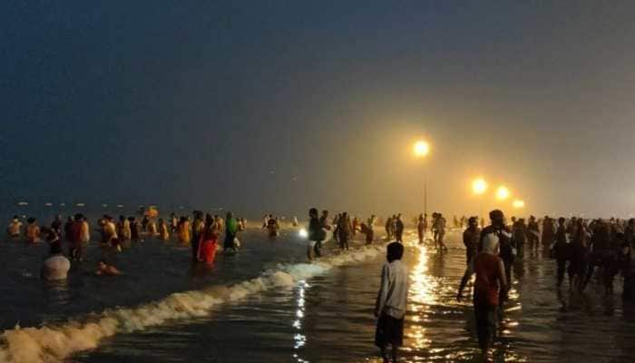 Makar Sankranti: People take holy dip at Gangasagar amid spike in COVID-19 cases