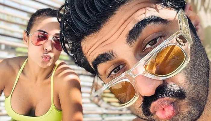 After quashing break-up rumours, Malaika Arora and Arjun Kapoor&#039;s &#039;love in 40s&#039; message shuts haters!